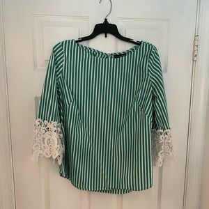 Green and white top. Size M